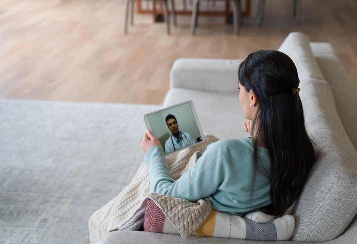 Woman at home on a telehealth call